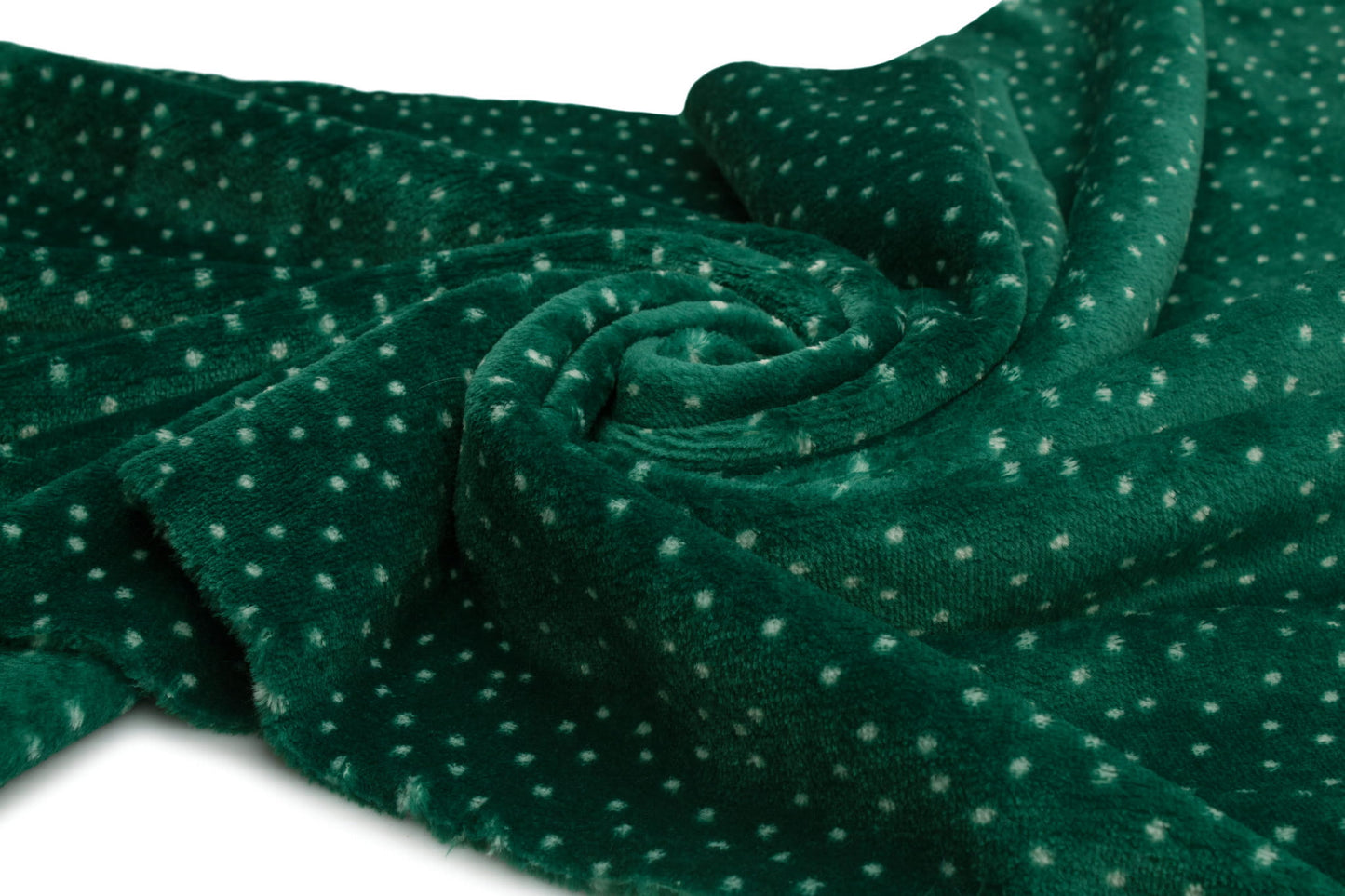 Bílé puntíky na zelené